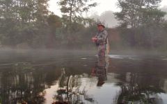 Adrian early morning spin fishing, Meander River..